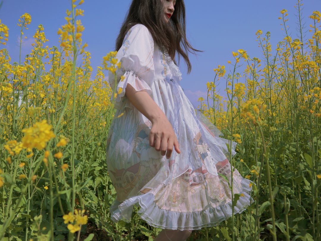 田园小清新，油菜花中女孩写真照