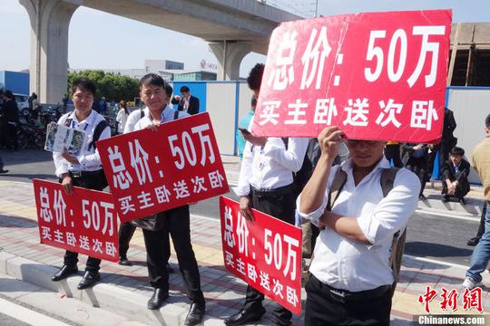 中国首列跨省地铁通车 催热当地房产