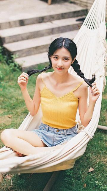 双马尾辫女孩呆萌可爱写真